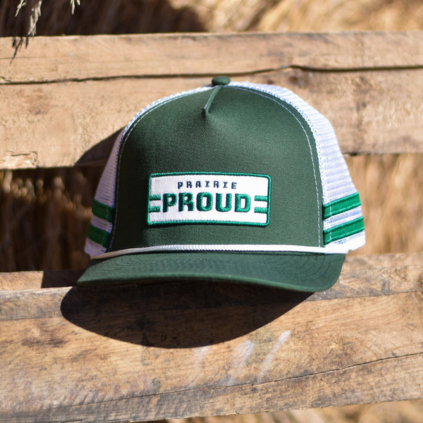 Green and white trucker hat with green stripes on the sides and the text 'Prairie Proud' on the front.
